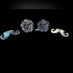 Set of 4 fun new stretch rings, sizes 7/8. Gold & silver mustache, & bling roses